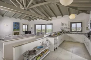 Villa Levanda's fully equipped kitchen opening onto the open-plan living space